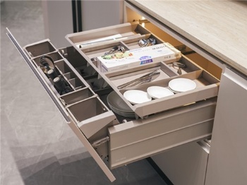 Titled pullout basket drawer