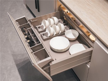 Titled pullout basket drawer